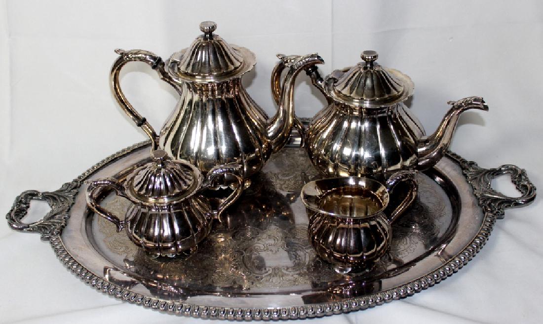Sterling Silver Tea Set With Silver Plated Tray: Sterling Silver Tea Set With Silver Plated Tray. Tea Pot 8 1/2" H X 10 1/2" W. Total Weight 72OZ