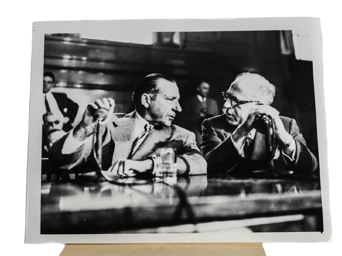 Black & White Photo of Frank Costello, Wide World: A black and white photo of Frank Costello (left) and his lawyer George Wolf (right) in the Federal Building as Costello refused to tell the crim prober's his net worth. This is from the original photo