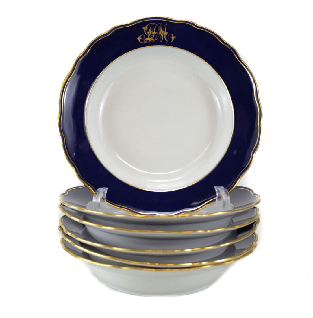 6 Meissen Porcelain Soup Bowls: 6 Meissen Germany porcelain soup bowls with cobalt blue scalloped rim and raised gilt script monogram. Circa 1900. Measures: 9 inch diameter tall Domestic Shipping: $50