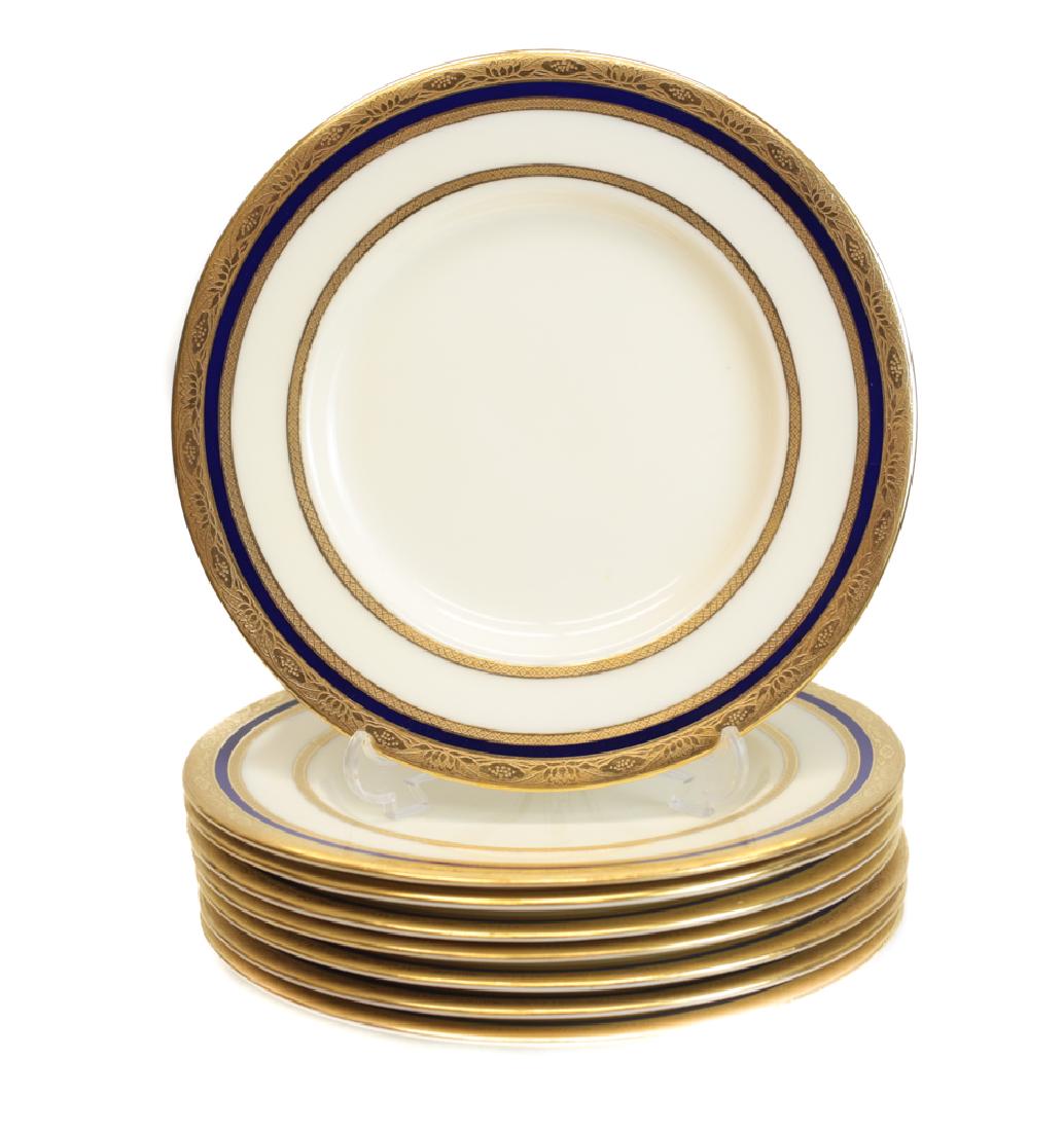Minton Salad Plates for Tiffany: 8 ivory porcelain salad plates by Minton for Tiffany & Co. Attractive gilt design with cobalt blue trim. Circa 1905. Measures: 7.5 inch Domestic Shipping: $50