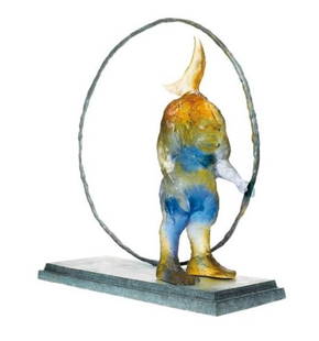 Daum Limited Edition Pate De Verre Sculpture: A Daum limited edition sculpture titled Enlacer L'espace originally designed by Richard Texier, a pate de verre figure with a crescent moon head sitting atop a patinated bronze base, holding onto a la