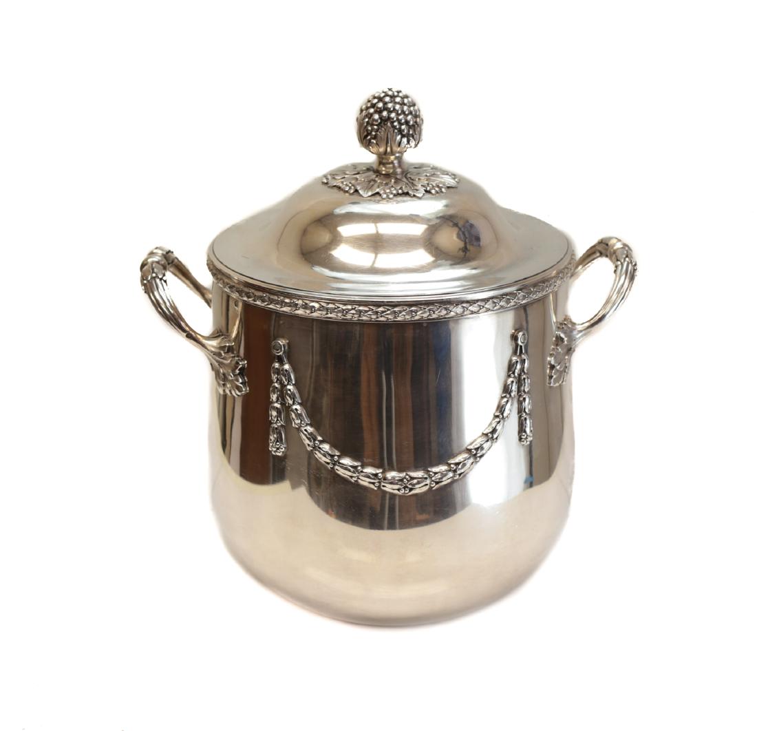 Andre Aucoc French Sterling Silver Ice Bucket: A fine French 950 silver ice pail bucket with cover by Andre Aucuc, late 19th Century. Decorated with leaf garlands of berries along the rim, reeded handles and berry finial. Weight: 48.97ozt Measures