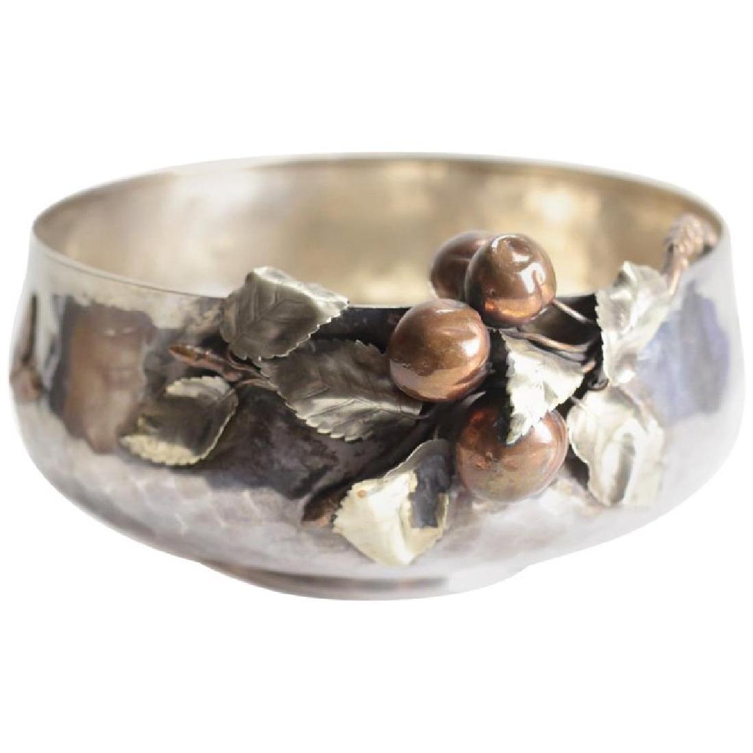 Gorham Sterling Silver & Mixed Metal Bowl: Gorham antique sterling silver and mixed metal Aesthetic Movement fruit bowl #1735, 1881. Hand hammered texture throughout the bowl with applied fruits and leaves to to the rim of the bowl. Marked to
