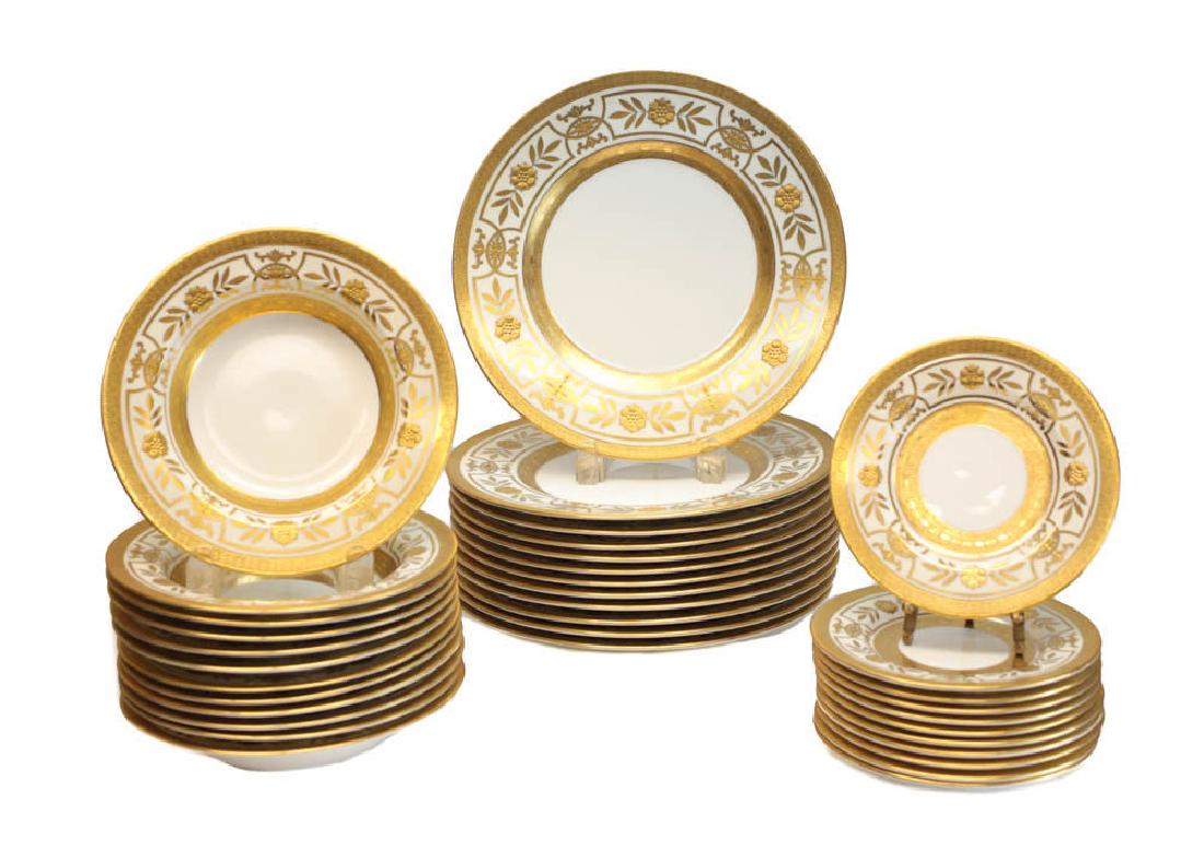 Minton Tiffany & Co Porcelain Dinner Service for 12: A very fine porcelain gold encrusted dinner service set for 12 by Minton and retailed by Tiffany & Co. Decorated in gilded florals and leaves. Set includes 12 dinner plates, 12 rimmed soup bowls, and 