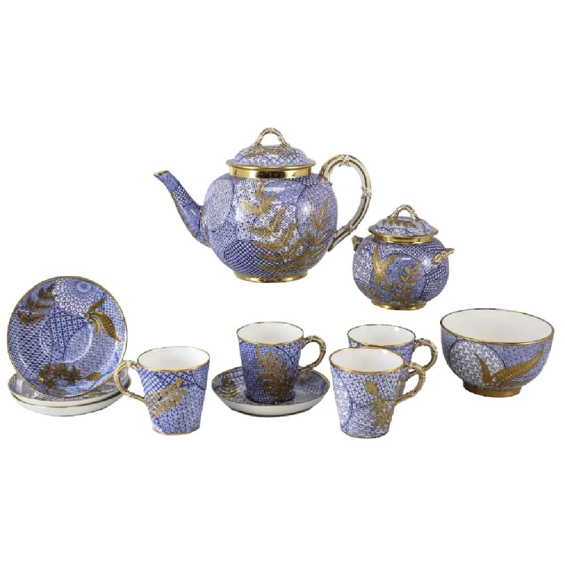 Royal Worcester Aesthetic Japonsim Tea Set: A 19th century English Porcelain tea service for four by Royal Worcester, with an all-over early aesthetic design incorporating various geometric patterns, overlay with raised gilt foliage and bamboo 
