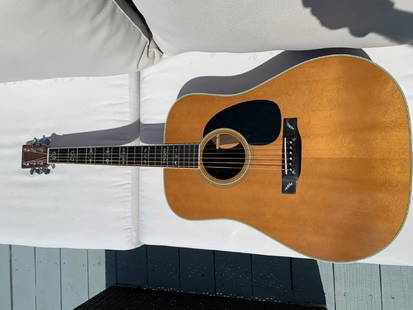 1970s Martin D-35 Natural Acoustic Guitar: 1970s Martin D-35 Natural Acoustic Guitar. Bright, clean finish throughout made of Indian and Brazilian rosewood. Serial Number:345633 Domestic Shipping: Please Inquire