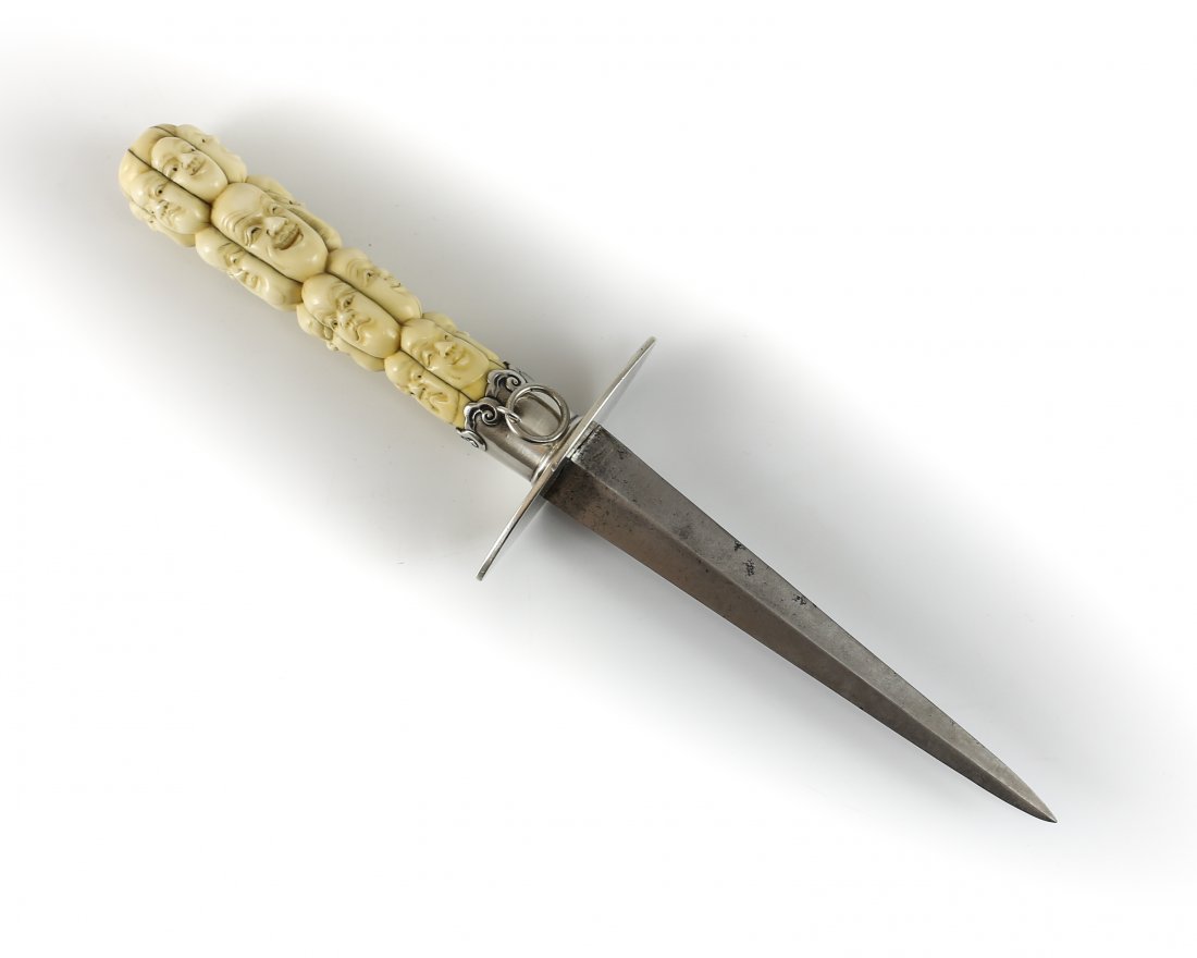 Tiffany & Co. Sterling Silver & Ivory Dagger/Letter: A very rare and unusual American early 20th Century Tiffany & Co sterling silver, stainless steel & finely hand carved ivory letter opener or dagger. The handle comprised of finely carved ivory depict