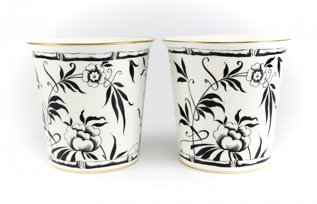 Pair of Hammersley & Co Planters Retailed by Tiffany &: A matching of black and white porcelain planters or flower pots by Hammersley & Co. England. Retailed by Tiffany and Co New York. Japanese motif with a bamboo & floral design and gold gilt trim. Measu