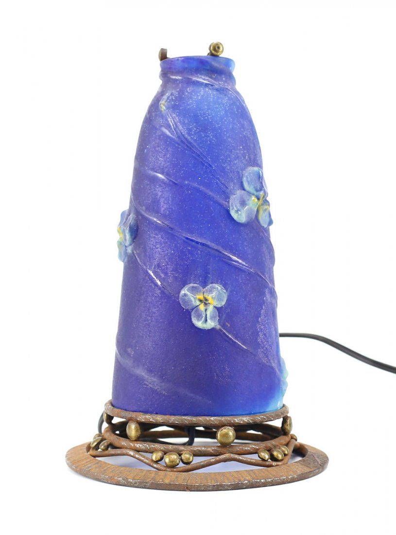 Amalric Walter Pate de Verre Glass & Iron Lamp: An Amalric or Almeric Walter Art Glass Table Lamp. Deep cobalt blue to light blue pate de verre glass shade features raised floral details wth yellow accents. - Sitting on its original Hand wrought ir