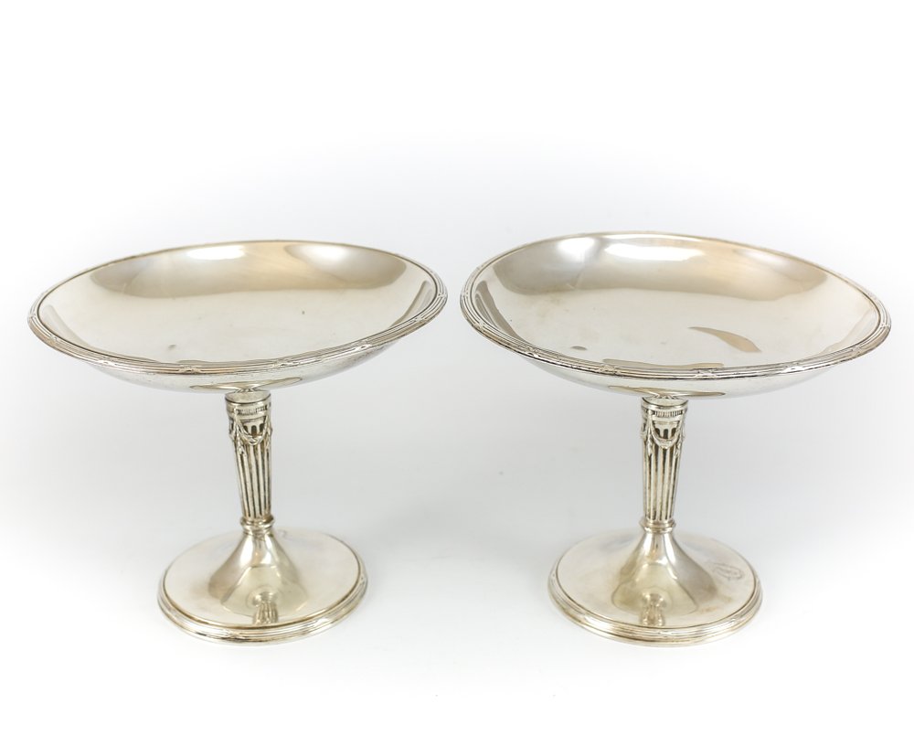 Pair 19th Century Christofle Silver Plate Compotes: A matching pair of 19th Century silver plated compotes by Christofle. The French compotes with columnular basesand roped rim. Eacih with an engraved amorial crest on base and marked "Christofle". One