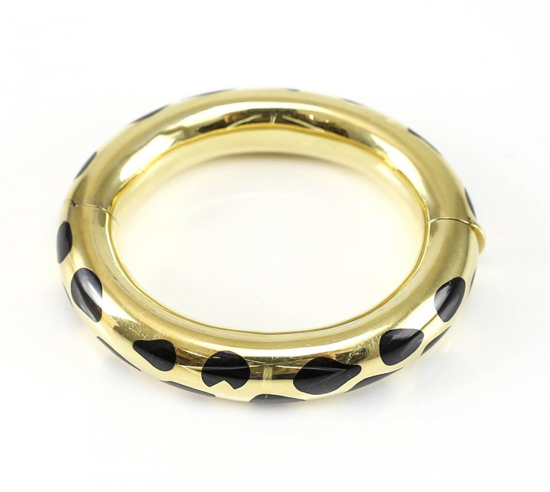 Angela Cummings Tiffany & Co Jade 18k Gold Bracelet: An Angela Cummings for Tiffany & Co. hinged ladies bangle bracelet consisting of black Jade and 18k Gold. Exquisite design, c. 1970 Measures: 75mm x 65mm, inside diameter is 54mm x 46 mm x 15mm The in
