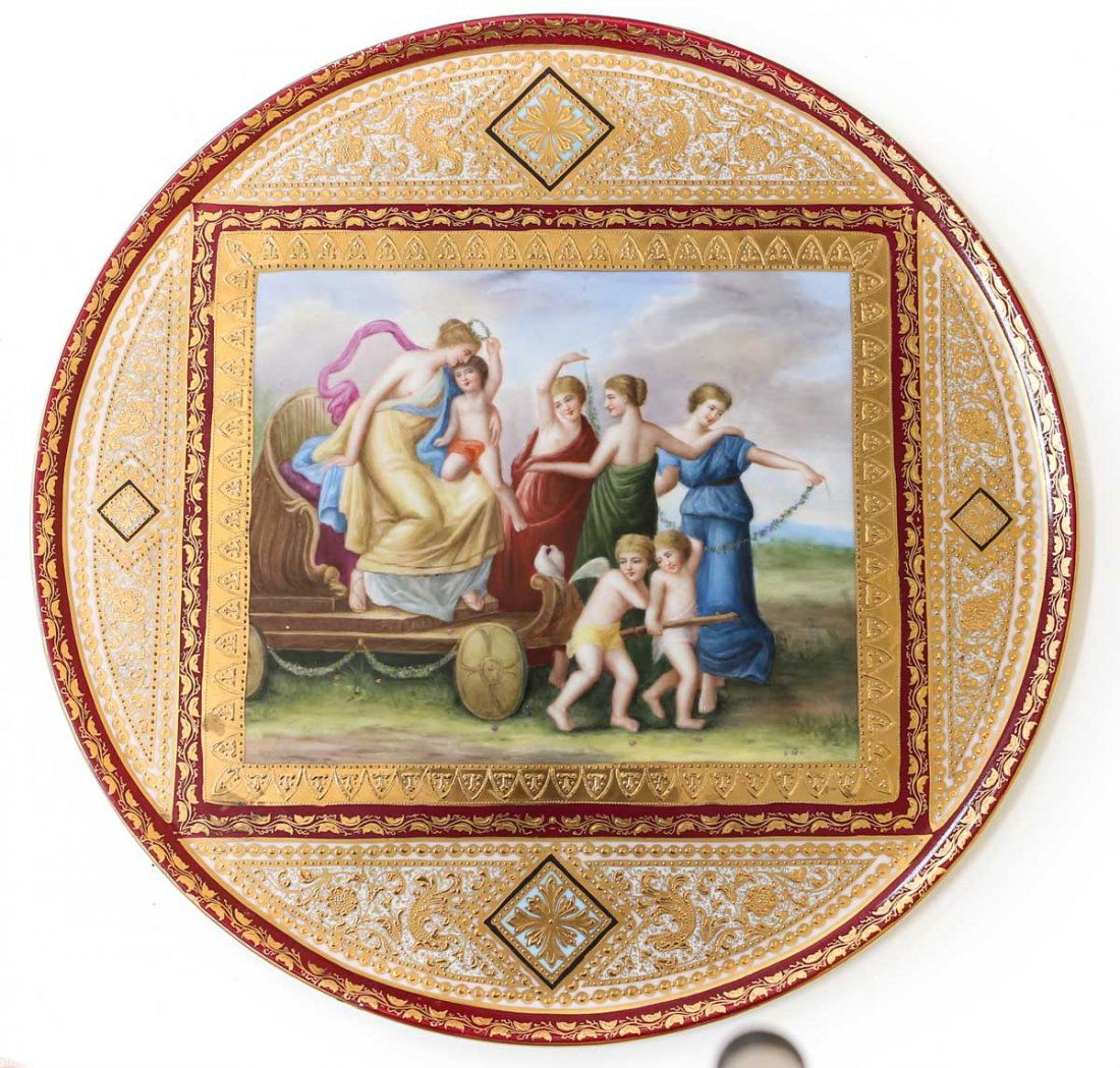 20" Royal Vienna Porcelian Tray Antiquity Scene Raised: Late 19th/ Early 20th Century Royal Vienna Porcelian Tray. Hand Painted classical scene comprising a chariot filled w/ partially nude women, Cherubs & doves complete w/ a rich scarlett and raised gilt