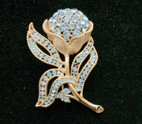 Vintage Crown Trifari Blue Rhinestone Rose Pin: Beautiful Early Vintage Designer Crown Trifari Blue Rhinestone Rose Pin, signed TRIFARI. MEASURES 2" X 1 1/2". IN HOUSE SHIPPING- FIRST CLASS USA, PRIORITY MAIL OR PRIORITY MAIL INTERNATIONAL OVERSEAS