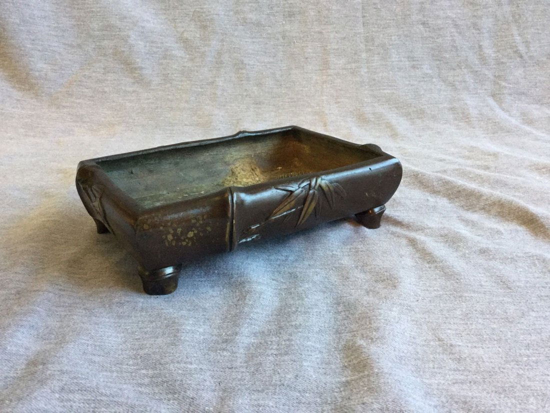 A Bronze Incense Burner: Dimensions are 8.2" x 5.8" x 2.5".