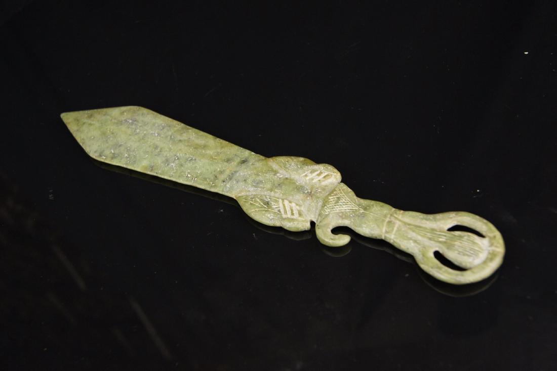 Han Dynasty Chinese Antique Old Hetian Nephrite Bi Jade: Han Dynasty Chinese Antique Old Hetian Nephrite Bi Jade Stone Sword Carving #653 - Description: Exquisite Han dynasty Hetian nephrite bi jade sword (ç¢§çŽ‰). Extremely nice hand carving! High p