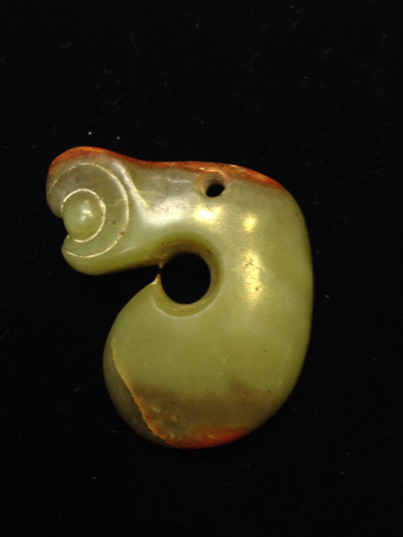 Neolithic HongShan Culture JadeÂ Dragon Hook Pendant: Measurements: 4.6cm*4.3cm*1.2cm (1.8IN*1.7IN*0.5IN); The Hongshan culture was a Neolithic culture in northeastern China. Hongshan sites have been found in an area stretching from Inner Mongolia to Lia