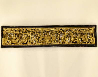 Chinese Wood Carving: A Chinese gold colored wood carving depicting scenes from imperial court life, including many figures, horses, flora and a Pagoda. Dimensions: 91X21X6 cm. Good condition, wear to plating, few missing