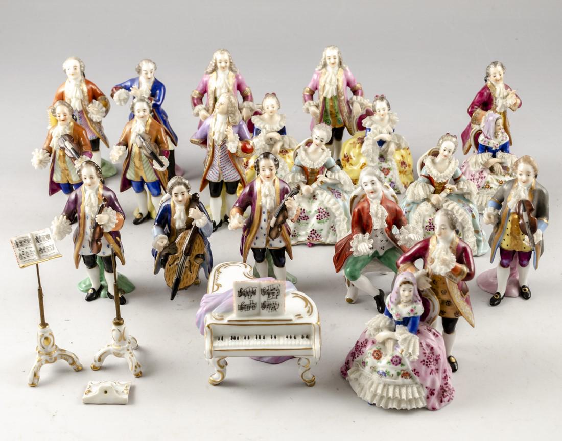 Collection of Porcelain Figurines: Collection of 19 miniature porcelain figurines, shaped as musicians, noble couples, musical instruments and more. Made by Aelteste Volkstedter Porzellanmanufaktur, Germany, ca. 1900. Length: 5.5-8 cm.