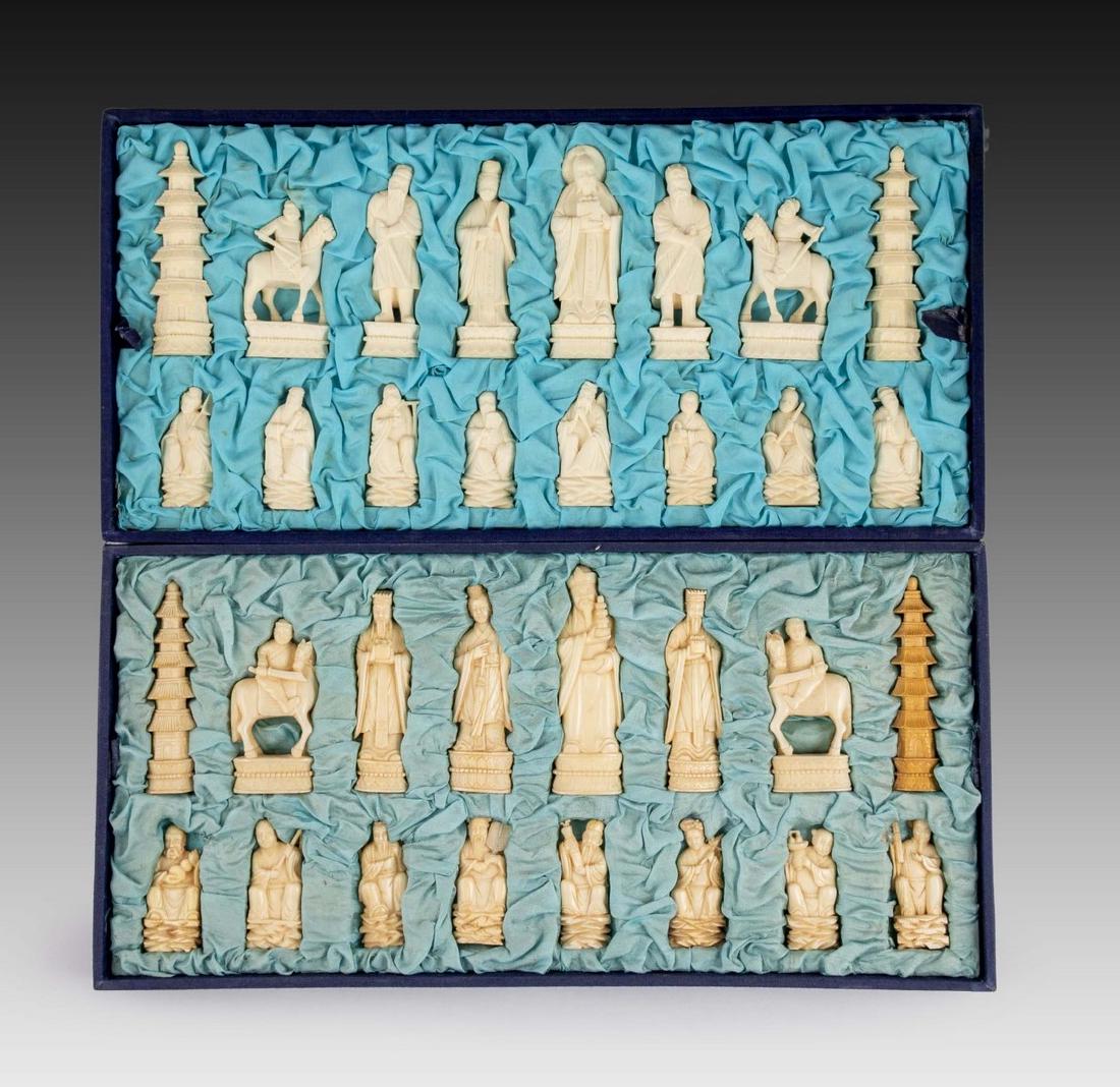 Chinese Carved Chess Set: Fine Chinese carved chess set. Contains 32 hand-carved pieces (complete), each piece uniquely designed. Height of pieces: 5-9 cm. Given in special box. Very good condition.