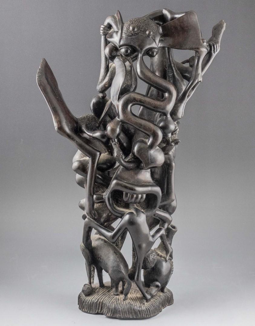 African Ebony Sculpture: "Hel", hand-carved African ebony sculpture, Makonde people, Tanzania. Height: 58 cm. Signed: "Francis Nchonyo Kundush D.S.M". Minor flaws.