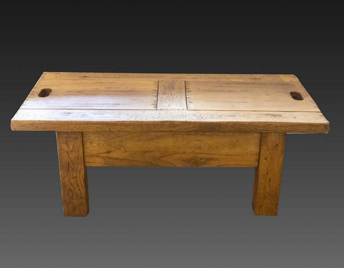 Rustic Wood Coffee Table: Rustic solid wood coffee table (probably oak), with two opening storage compartments. Dimensions of plate: 120X60, height: 47 cm. Minor stains. Provenance: Ilana Rovina estate. This lot is for local p