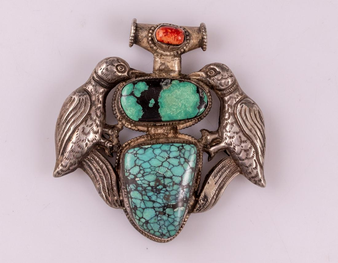 Silver Pendant: Silver pendant, Probably East Asian, decorated with birds, bears, etc. Set with turquoise and coral stones. Height: 8 cm. Weight: 117 grams. Unsigned, silver tested.