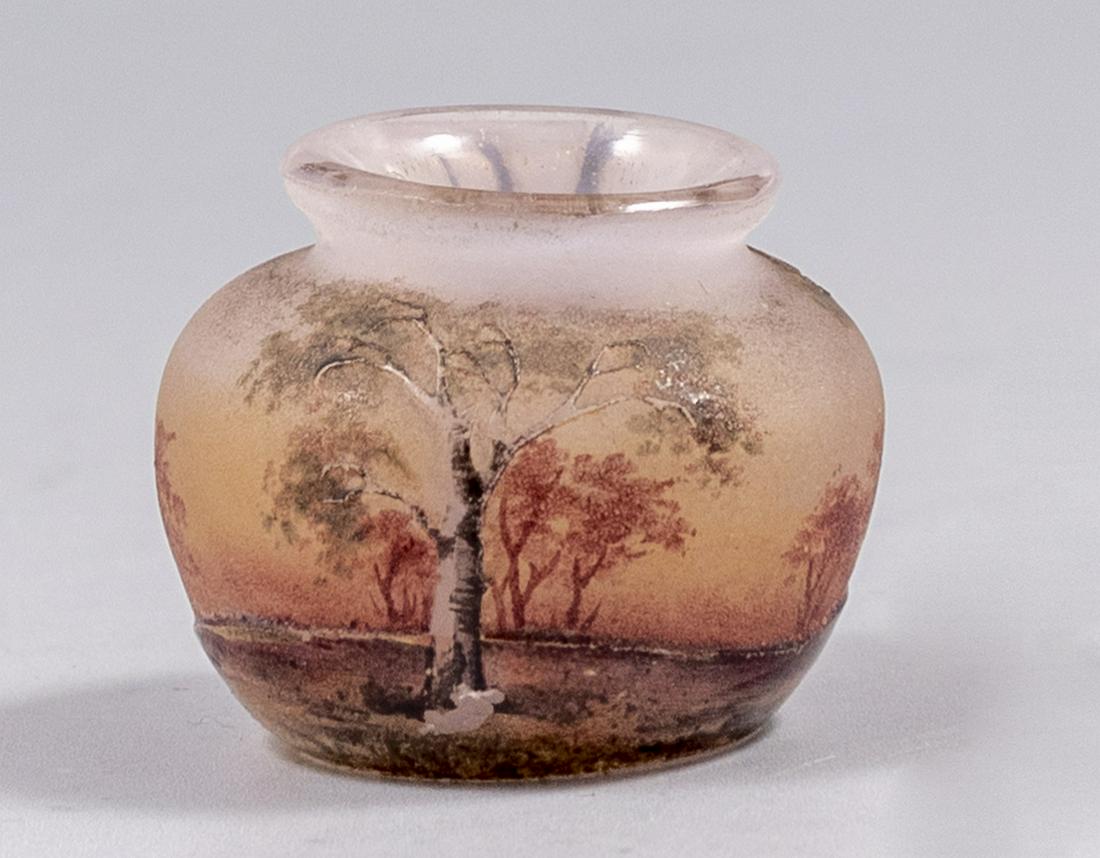 Cameo Glass Vase, Daum Nancy: C. 1900 miniature PÃ¢te-de-verre glass vase by Daum Nancy, France. Decorated with etching and enamel painting of trees. Height: 2.6 cm. Signed.
