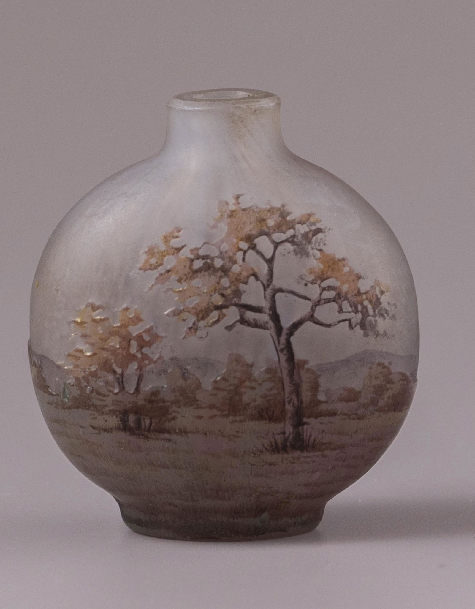 Cameo Glass Miniature Vase, Daum Nancy: C. 1900 PÃ¢te-de-verre miniature glass vase by Daum Nancy, France. Decorated with etching and enamel painting of trees. Height: 4.2 cm. Signed.