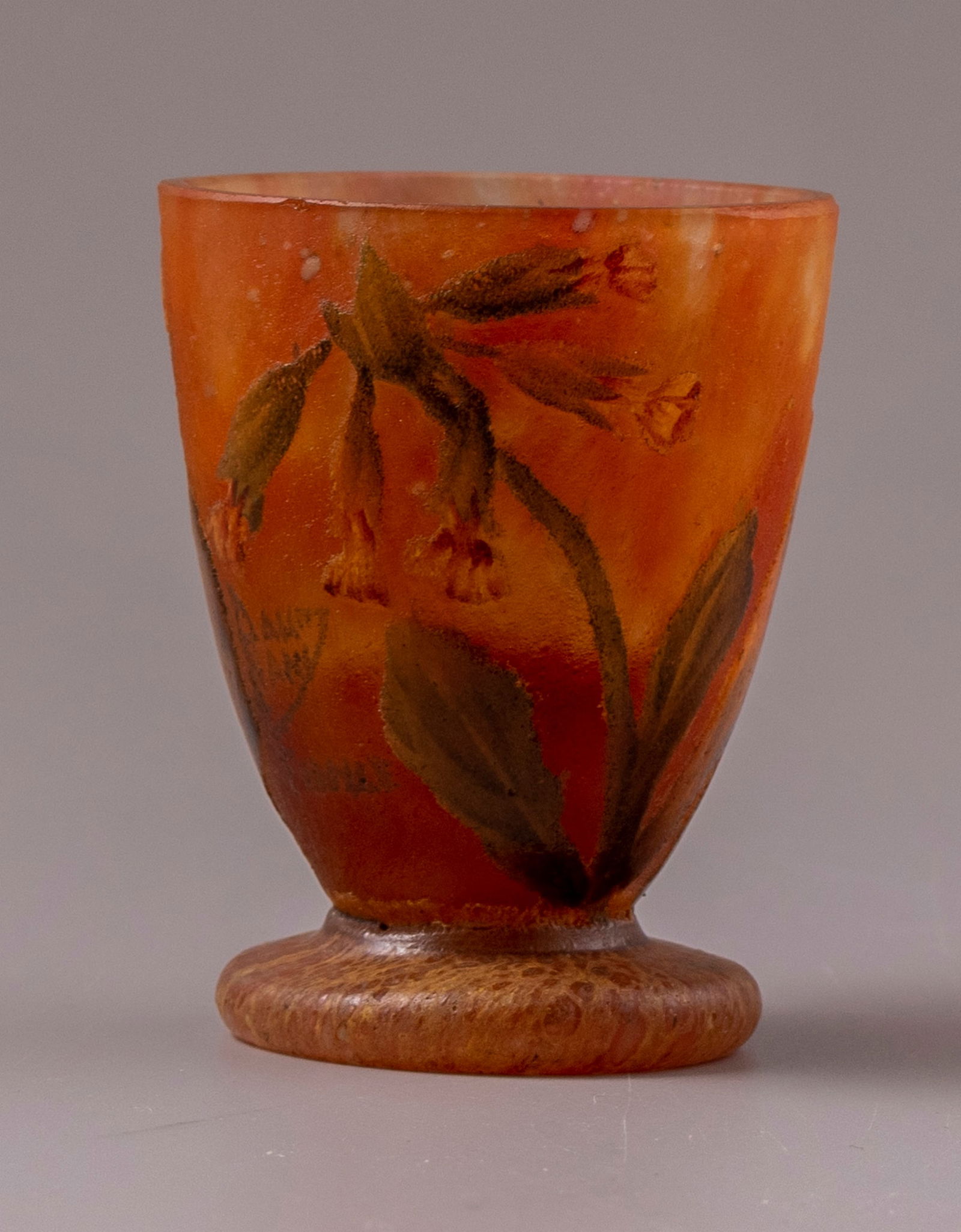 Cameo Glass Vase, Daum Nancy: C. 1900 miniature PÃ¢te-de-verre glass vase by Daum Nancy, France. Decorated with etching and enamel painting of flowers. Height: 5.7 cm. Signed. Minute chips on the upper rim.