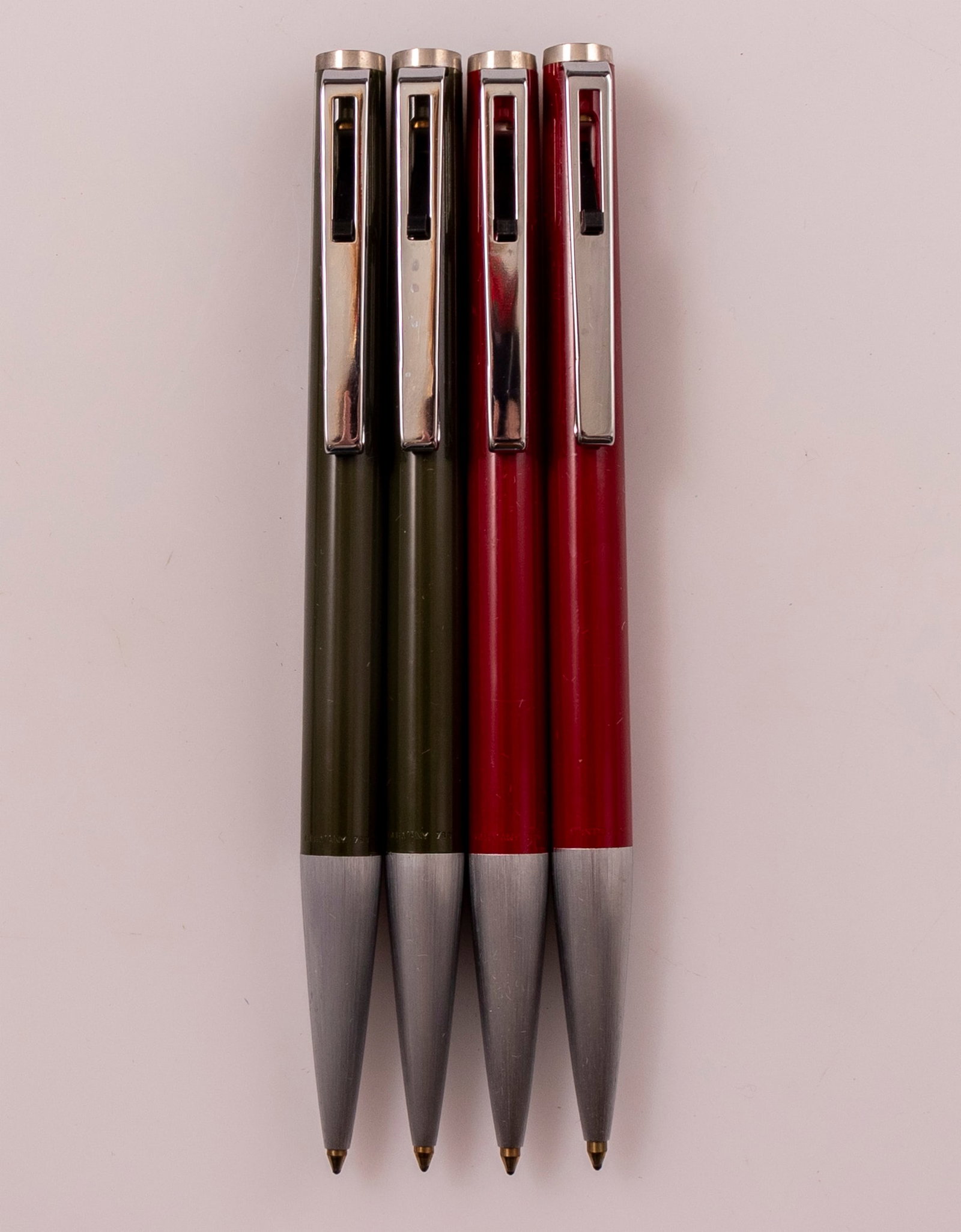 Montblanc 780 Ballpoint Pens: Lot of 4 Montblanc 780 ballpoint pens, Lever on clip, Various colors. Size: 5" (12.7 cm). Mint, NOS, no refill to 2 pens.