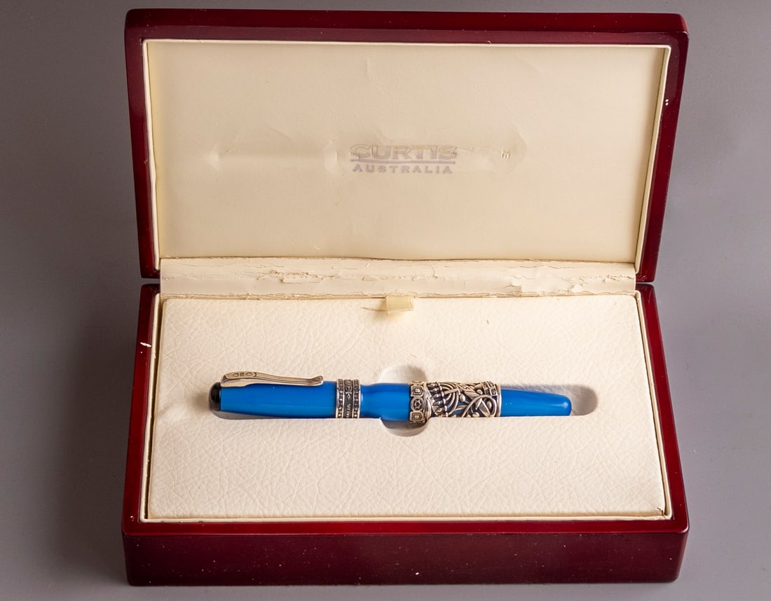 Curtis Israel 60th Anniversary Fountain Pen, Limited Edition: Curtis Israel 60th Anniversary fountain pen, Blue with sterling silver overlay, Limited edition. Size: 5.5" (14 cm). 14K white gold nib, M. Numbered 101/1948. Mint condition, never inked. In original