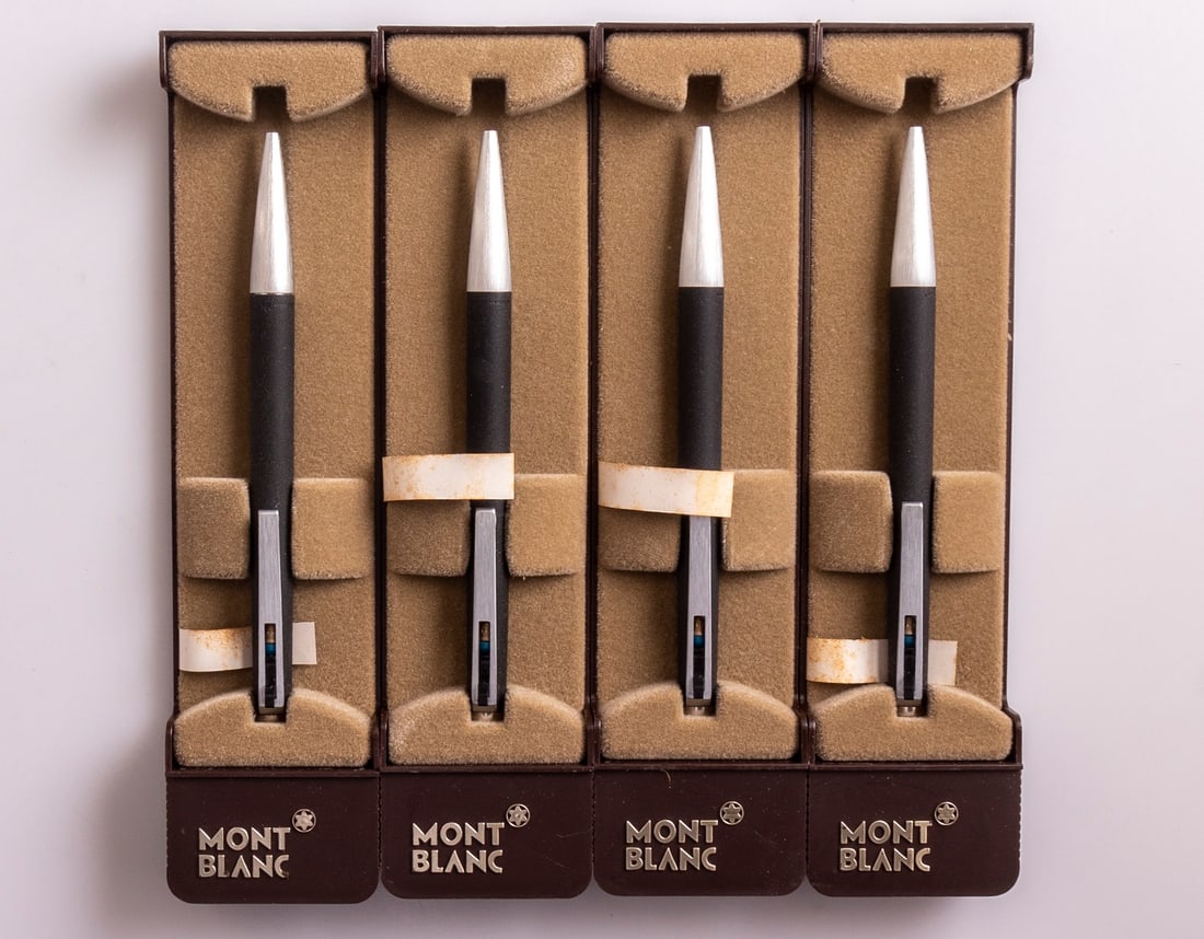 Montblanc 782 Ballpoint Pens: Lot of 4 Montblanc 782 ballpoint pens, Lever on clip, Black & steel. Size: 5" (12.7 cm). Mint, NOS, in original case, refill might be dry.