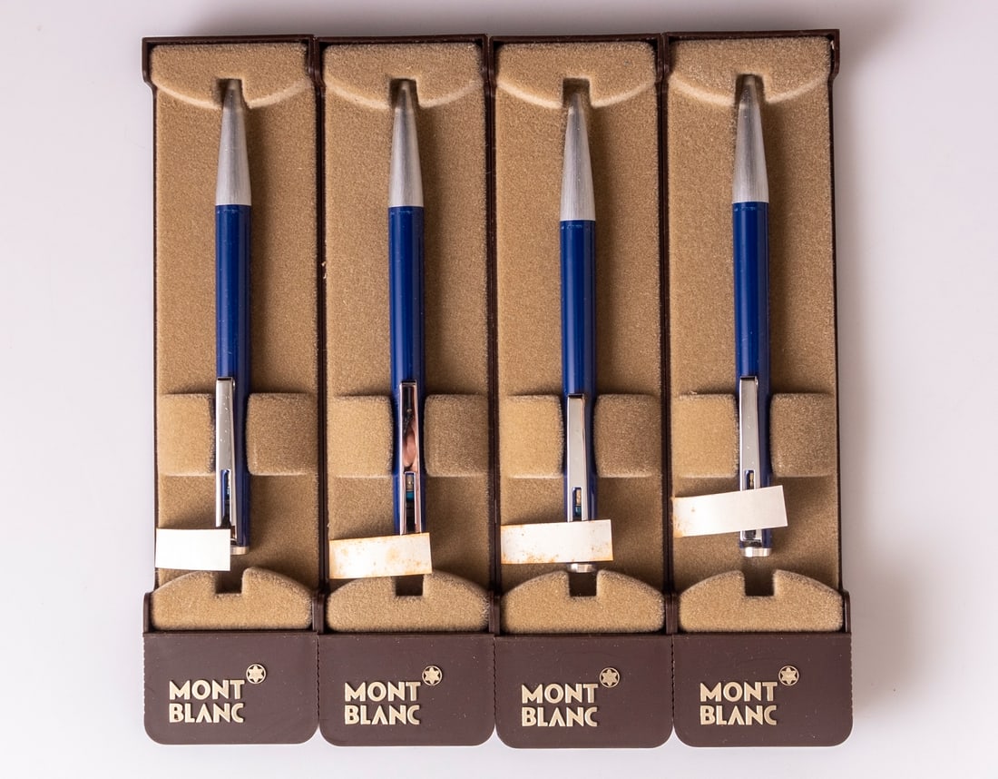 Montblanc 780 Ballpoint Pens: Lot of 4 Montblanc 780 ballpoint pens, Lever on clip, Blue & steel. Size: 5" (12.7 cm). Mint, NOS, in original case, refill might be dry.