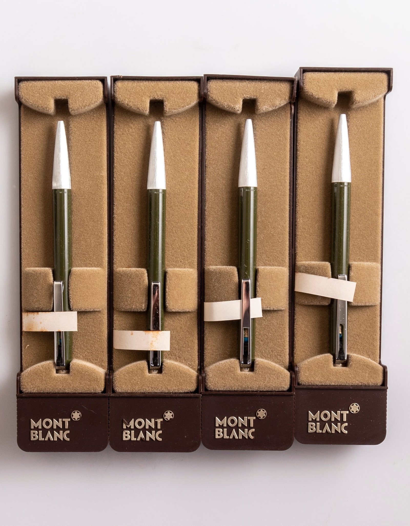 Montblanc 780 Ballpoint Pens: Lot of 4 Montblanc 780 ballpoint pens, Lever on clip, Green & steel. Size: 5" (12.7 cm). Mint, NOS, in original case, refill might be dry.