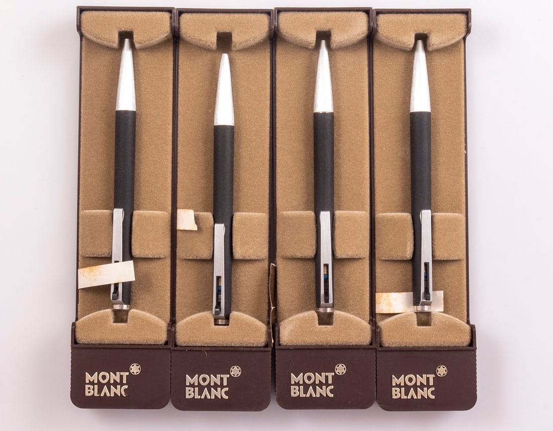 Montblanc 782 Ballpoint Pens: Lot of 4 Montblanc 782 ballpoint pens, Lever on clip, Black & steel. Size: 5" (12.7 cm). Mint, NOS, in original case, refill might be dry.