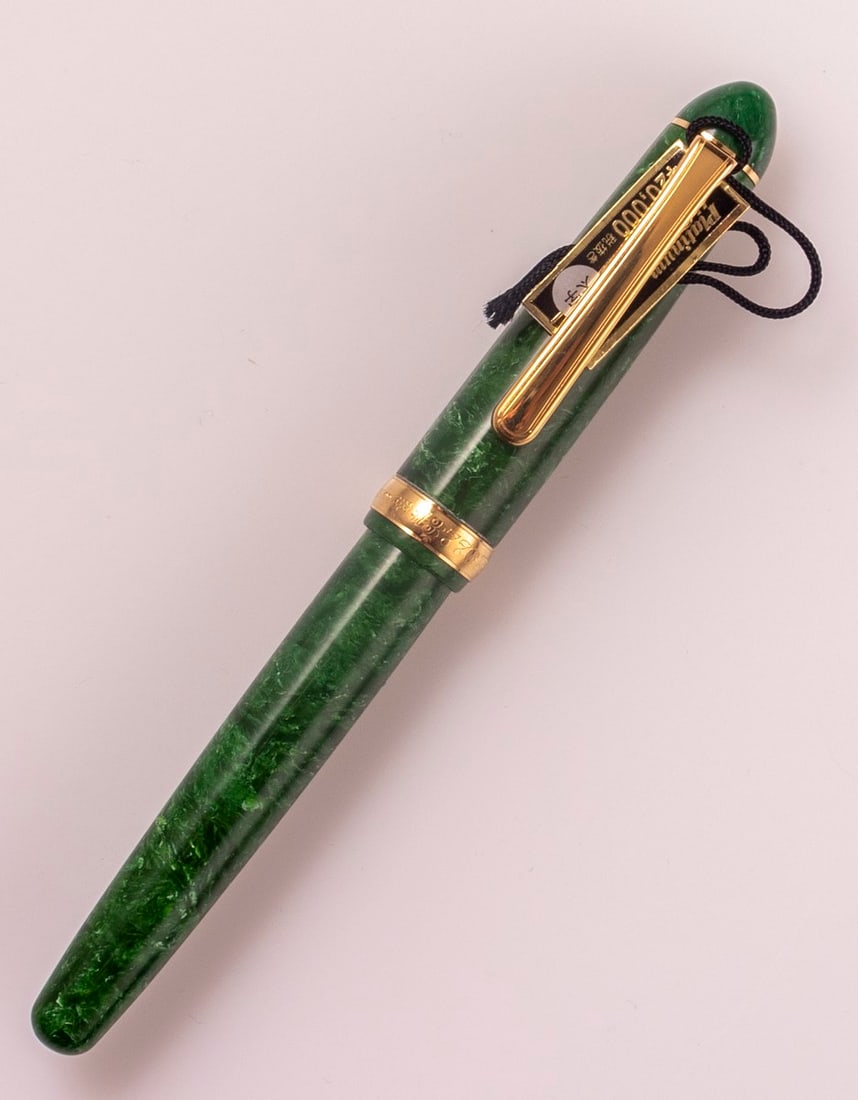 Platinum Fountain Pen, 3776: Platinum 3776 celluloid fountain pen, Emerald Green, gold plated trims. Size: 5.3" (13.5 cm). 18K gold nib, B. Mint condition, NOS.