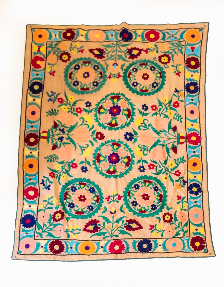Uzbek Suzani: Uzbek Suzani, hand embroidered with floral motifs. Dimensions: 182X129 cm.