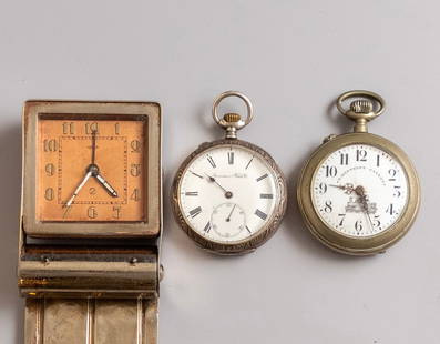Watches: Lot of 3 watches, including: * A travel alarm clock by Jaeger LeCoultre. Dimensions (closed): 8X3X6 cm. Unknown working condition. * A pocket watch by IWC Schaffhausen, chronometer, silver case. Diame