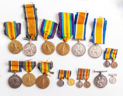 British War Medals: Lot of 16 British war medals commemorating participation in World War I, including four Victory Medals, five War Medals and seven miniature medals of the same types.