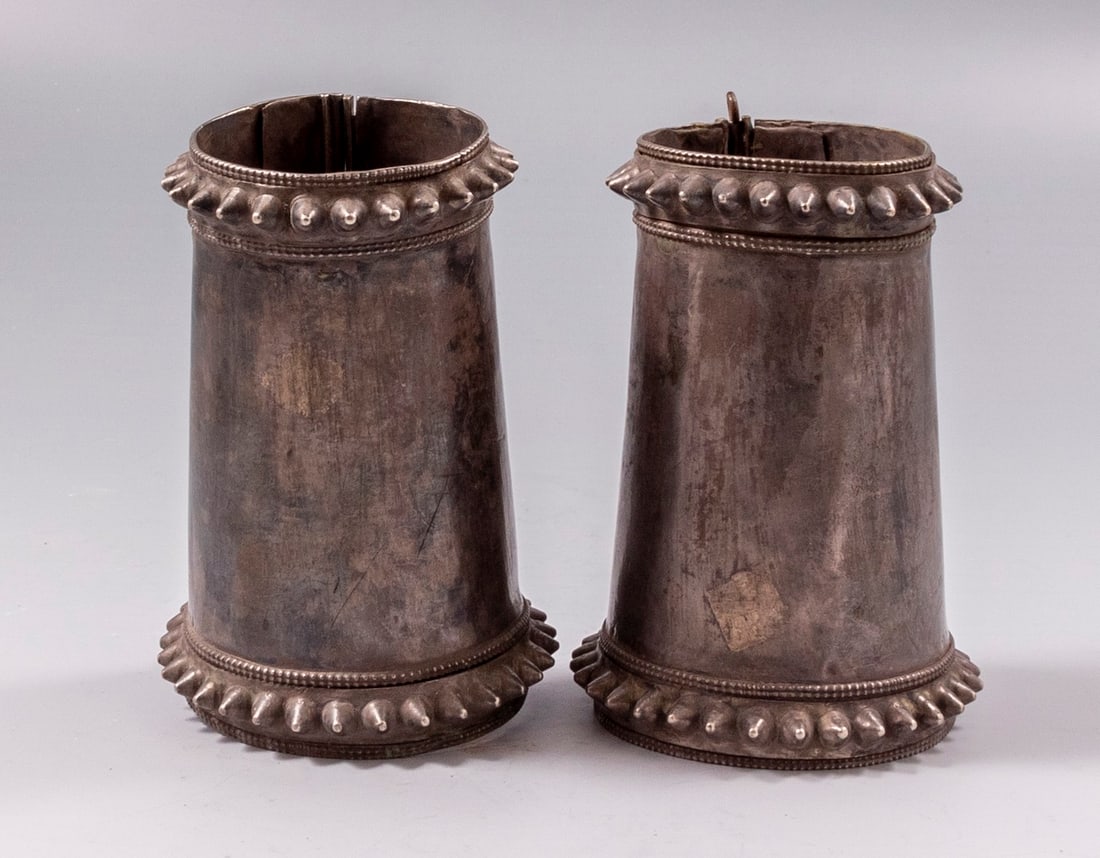 Indian Ethnic Silver Bracelets: Pair of Indian (Pushkar) silver cuff bracelets. Width: 11 cm. Diameter: 5-6.5 cm. Total weight: 287 grams. Unmarked, tested silver.