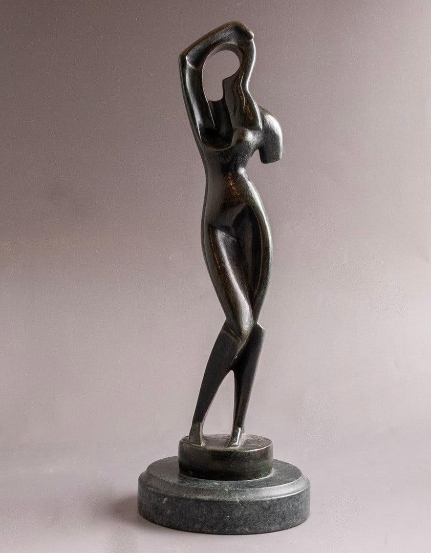 After Alexander Archipenko (1887-1964): After Alexander Archipenko (1887-1964), “Femme au peigne” (woman combing her hair), 1915, bronze sculpture attached to a marble base, height (including base): 37 cm, Signed and dated.