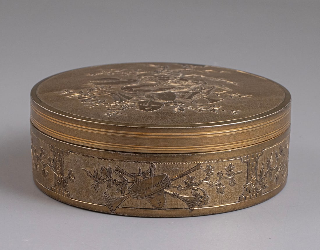 French Gilt Silver Box: French gilt silver box by F. Ducot, Bordeaux. Engraved with floral motifs, animals, and additional decorative elements. Diameter: 9 cm. Weight: 150 grams. Hallmarked. Minor wear to the gilding on the