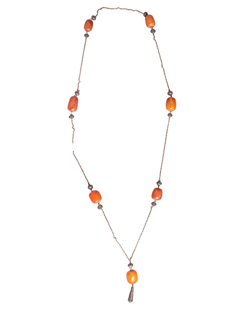 Silver & Amber Necklace: An ethnic necklace with silver filigree and amber beads. Length: 116 cm. Length of silver beads: 1-14 cm. Length of amber beads: 2-3 cm. Total weight: 74 grams. Silver tested, missing clasp.