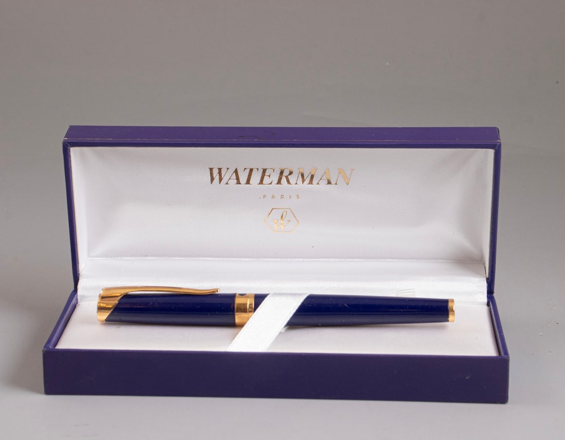 Waterman L'etalon Fountain Pen: Waterman L'etalon fountain pen, Blue lacquer with GP trims. Size: 5.45" (13.9 cm). 18K gold nib, M. Good condition, minor scratches. In case.