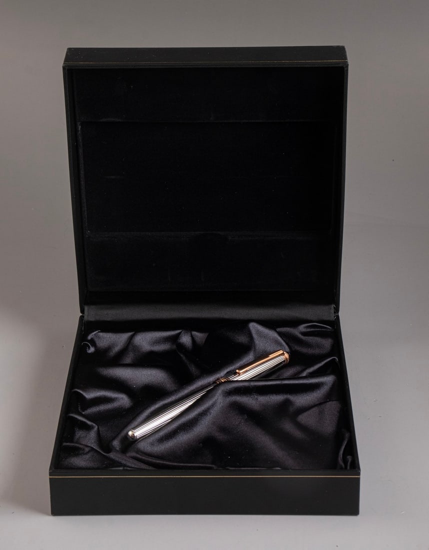 Montblanc LE Fountain Pen, 75 Years of Passion and Soul, Sterling Silver: Montblanc Limited edition fountain pen, Meisterstück 144, 75 Years of Passion and Soul, sterling silver, set with a diamond. Numbered 0988/1924. Size: 5.3" (13.5 cm). 18K gold nib, M. Mint in