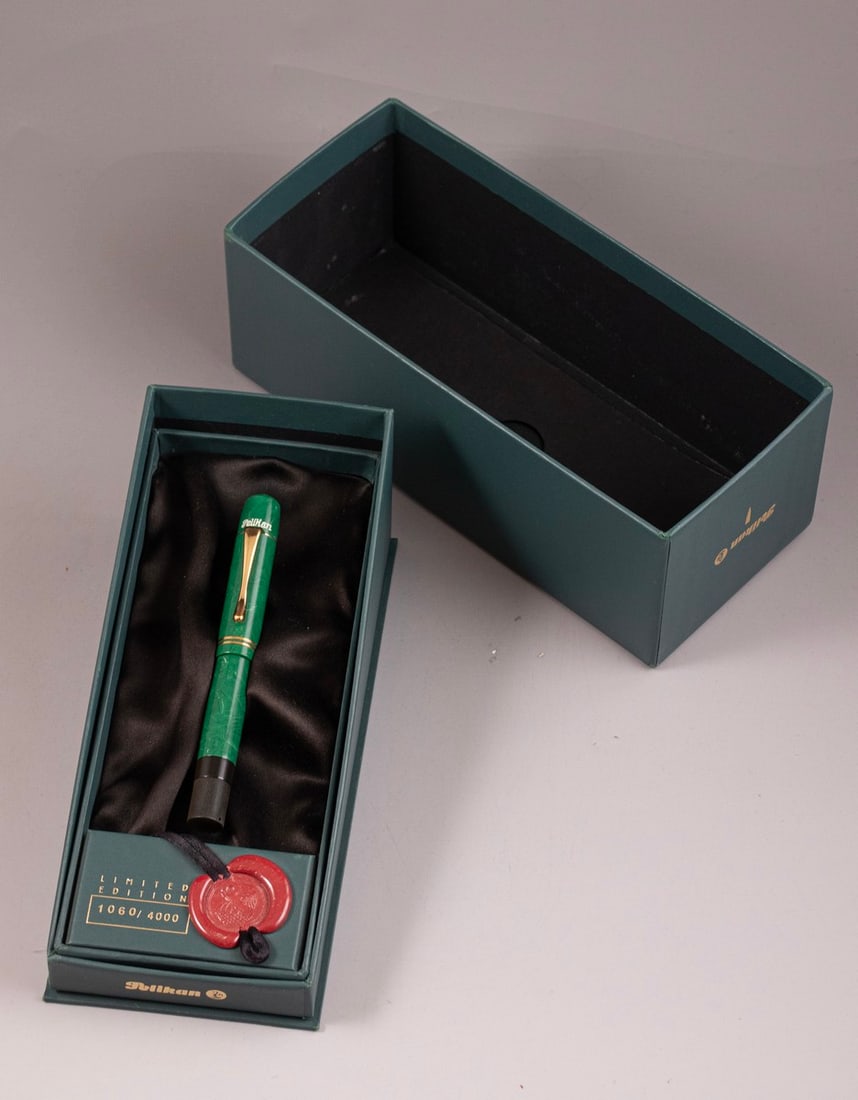 Pelikan Limited Edition 1935 Originals of their Times Fountain Pen: Pelikan Fountain pen, Originals of their Times 1935 Limited edition, 2000's reissue of a jade green Pelikan 100. Size: 4.6" (11.7 cm). 18K gold nib, M. Numbered 1080/4000. Mint condition, in original