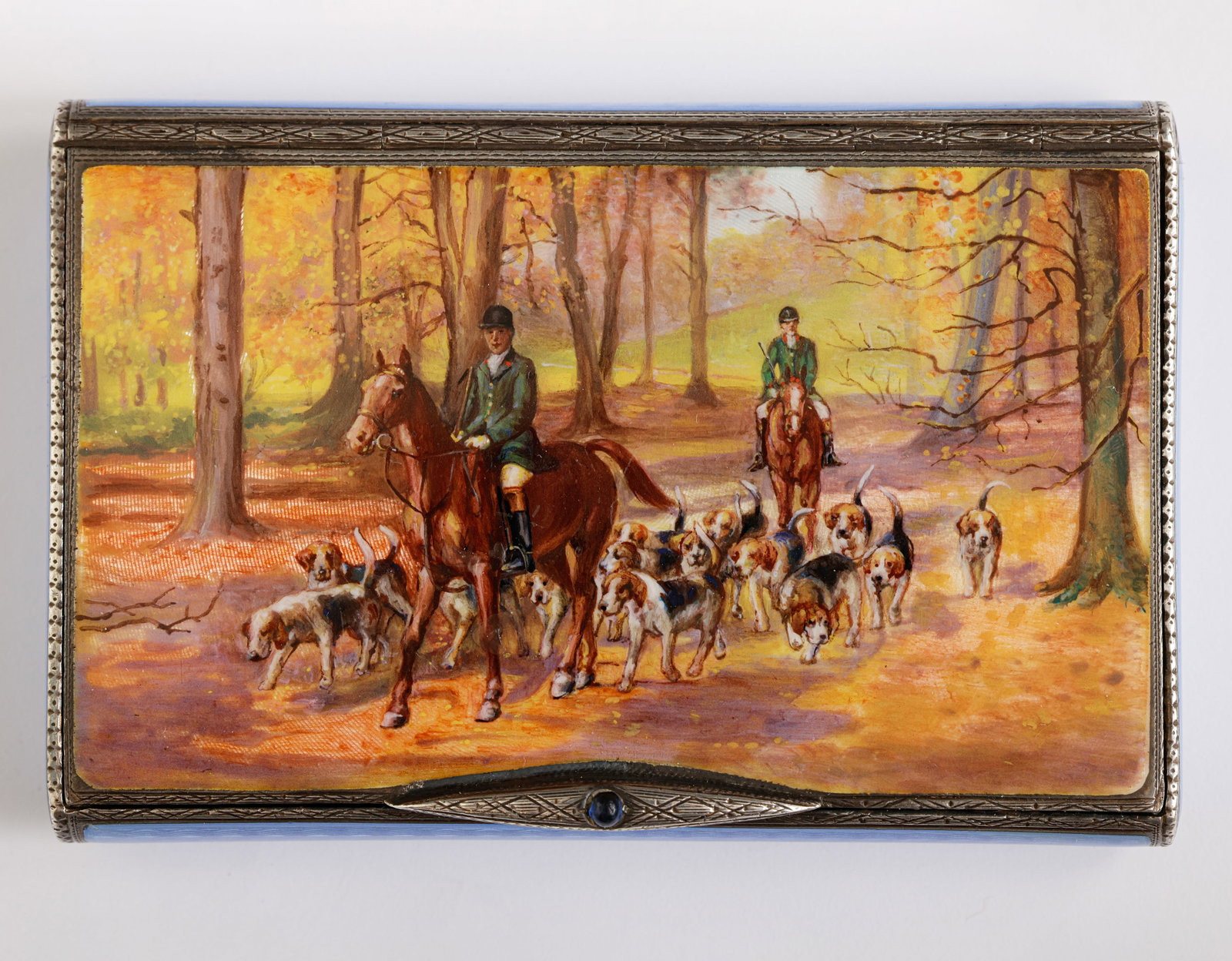 Austrian Silver Snuff Box: Austrian sterling silver snuff box, decorated with enamel work depicting a hunting scene and guilloché decoration. Dimensions: 8X5X1 cm. Weight: 112 grams. Hallmarked (English import marks). Exce