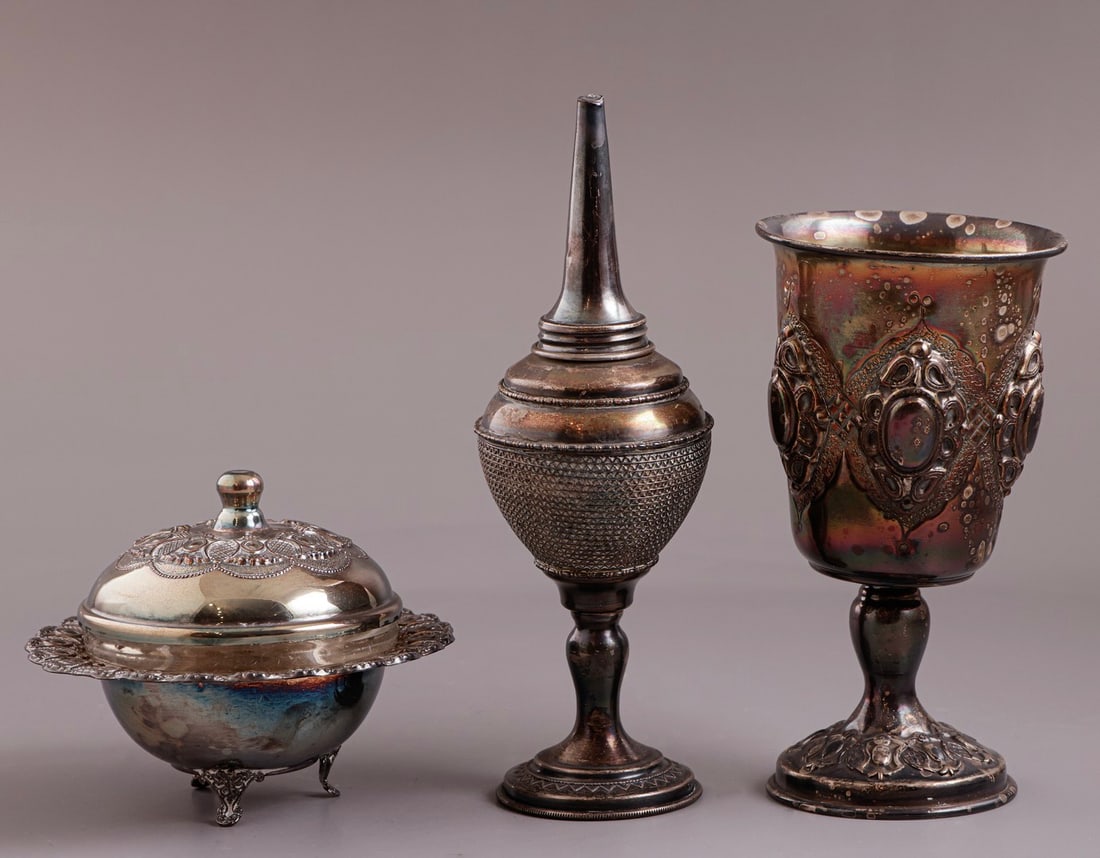 Silver Havdalah and Kiddush Items, Hazorfim: Lot of 3 sterling silver Havdalah and Kiddush items by Hazorfim, including a Kiddush cup, spice container, and bowl. Height: 9–17 cm. Weight: 257 grams. Hallmarked. Missing flag.