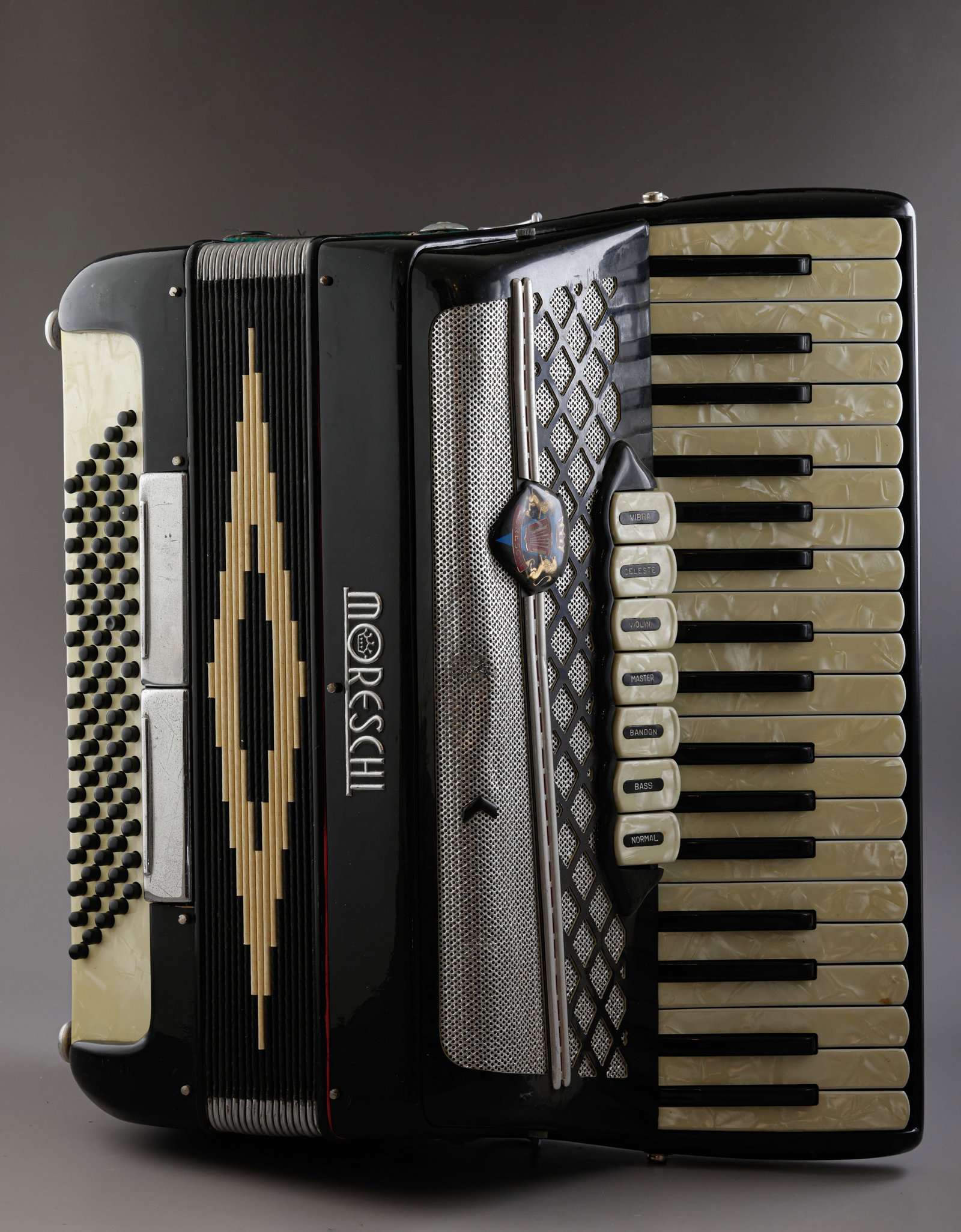 Moreschi Accordion: 41 key accordion by Moreschi, Italy. Dimensions: 46X17X37 cm. Minor flaws.