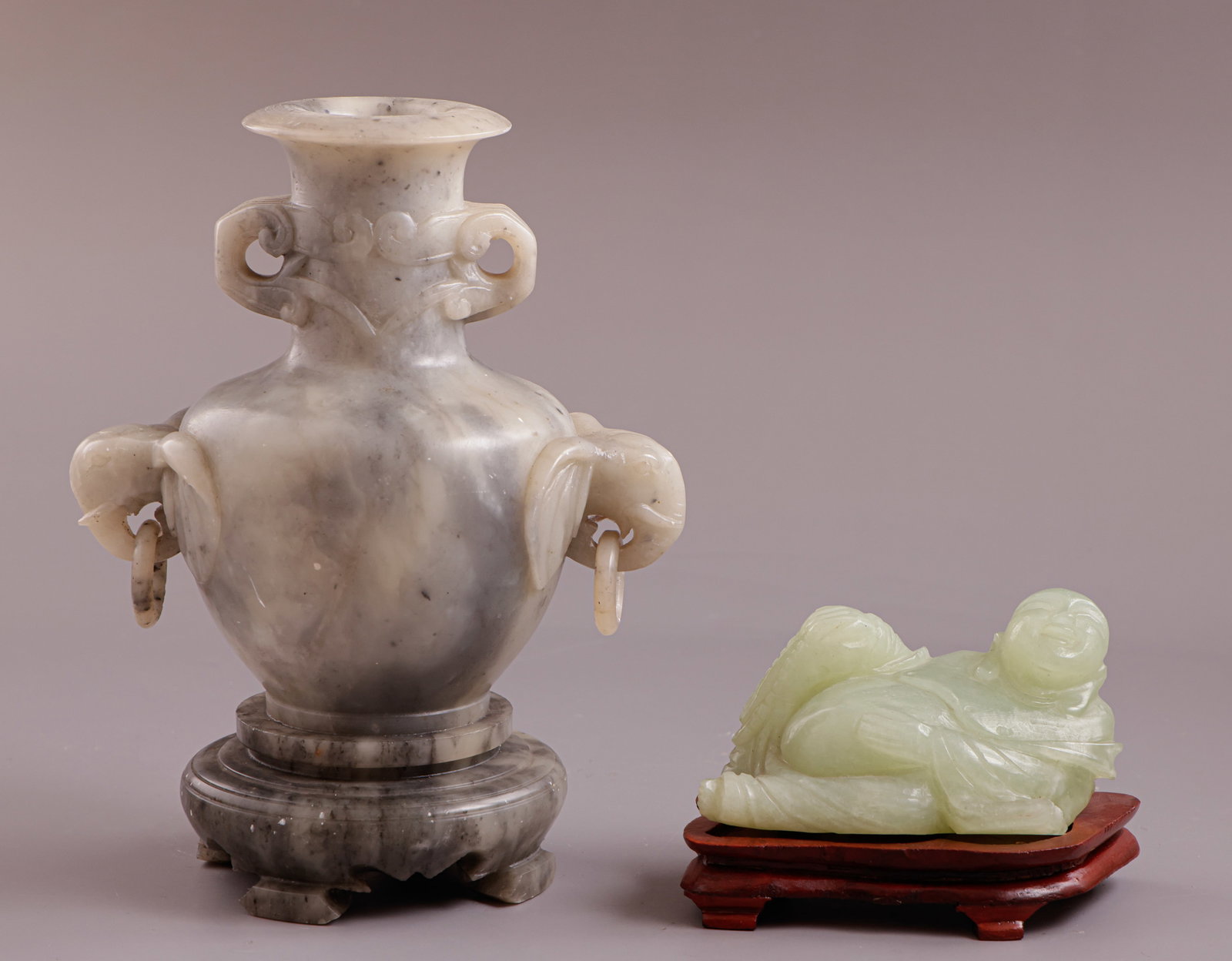 Chinese Items: Lot of 2 Chinese items, including a soapstone incense burner decorated with elephant heads, and a carved figurine of Buddha on a wooden base. Height/length: 18.5–10 cm. Minor flaws to the